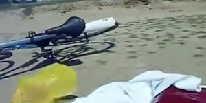 Kinky couple filming their beach fuck