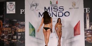 Beautiful models move on the catwalk in flimsy bikinis