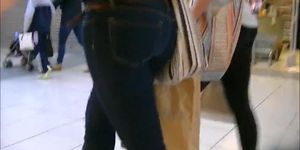 Candid ass in tight jeans and boots