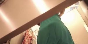 Girl trying on dress in change room gets upskirt spied