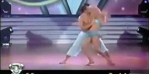 Short skirt girl dances on TV and flashes booty