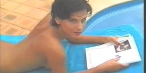 Rebekah Teasdale is naked by the pool