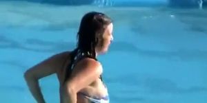Tiny boobs and ass exposed on the waterslide