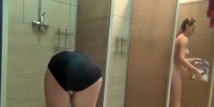 Mature women in the shower room