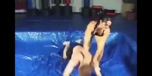 Mixed Wrestling on blue tarp