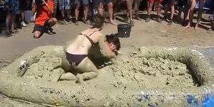 Two amateurs fighting in the mud