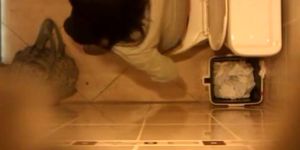 Spy camera secretly installed in toilet ceiling