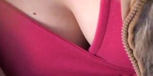 A hot public downblouse look see of a japanese girl's boobs