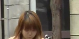 Cute Japanese girl with her panties exposed during sharking
