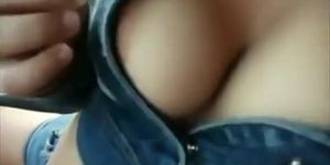 Hitchhiker flashes her sexy boobs in the car