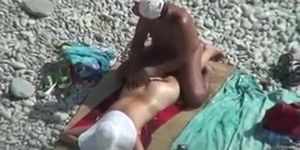 Couple caught on beach, hidden cam