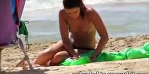 Topless legal age teenager with not her grandfathers at beach