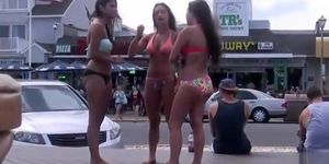 Three cuties with big asses on the boardwalk