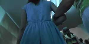 Sexy girl in a-line blue dress presents upskirt goodies