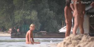 Hot blokes and sexy chicks tanning their bodied on the nudist beach