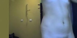 Woman with small tits in tanning room