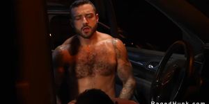 Muscle hunks suck and fuck in car in parking