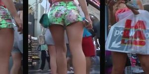 Ideal girl's ass cheeks fall out of shorts