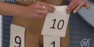 Russian News Host Strips Off Sticky Notes Until She's Completely Naked on Live TV