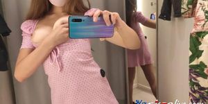 In the fitting room of HM I touch my small Tits and pussy