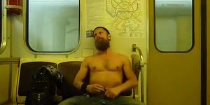 Bearded Russian guy rubs his big cock on the subway