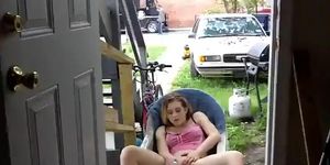 masturbating in front of house