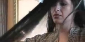 Foxy anya brushes her hair topless