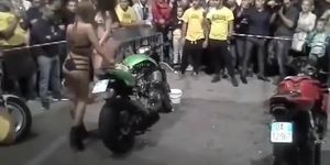 Bike washing competition with sexy babes in swimsuits