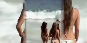 Girl with a sexy bikini enters the water