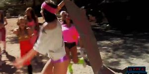 Busty college teens at camp doing topless aerobics