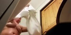 Chubby mature woman caught in bathroom