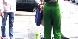 chick in green squatting ass
