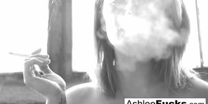 Busty Ashlee Graham smokes while showing off her natural tits (Ashley Graham)