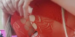 Have a look at nasty Susi showing pussy in red fishnet