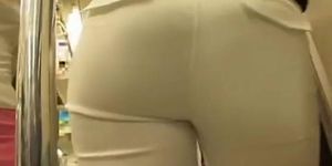 Candid ass video with girl in tight light trousers