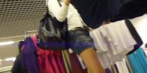 Upskirt video of a chick with white panties in the department store