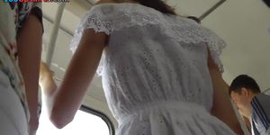 Sexy girl in white dress in the accidental upskirt video