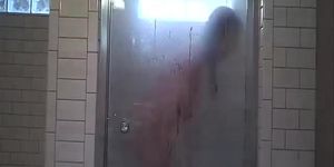 Wife shaving in shower