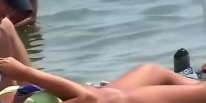 Nudist girls enjoying the water