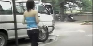 Asian teen gets a boob sharking in broad day light.