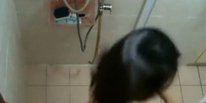 Little asian butt on a hidden shower cam