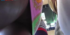 Lilac belt up petticoat of bus passenger