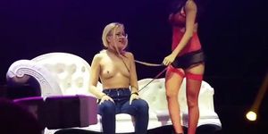 Stripper strips a audience girl