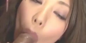Japanese girl slurps cock