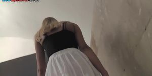 G-string upskirt clip of a blonde coming down on stairs