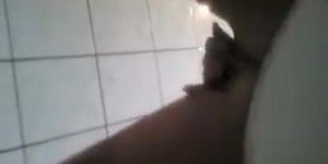 Wicked girl masturbates her pussy on the toilet seat