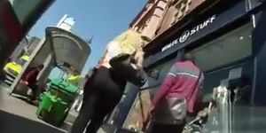 Shopping girl with a big butt in tight pants