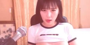 Korean tiny camgirl beauty plays with her pussy