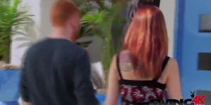 Redhead couple joins others at the pool to mix and mingle before partying