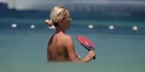 Nice boobs blonde topless playing racket ball